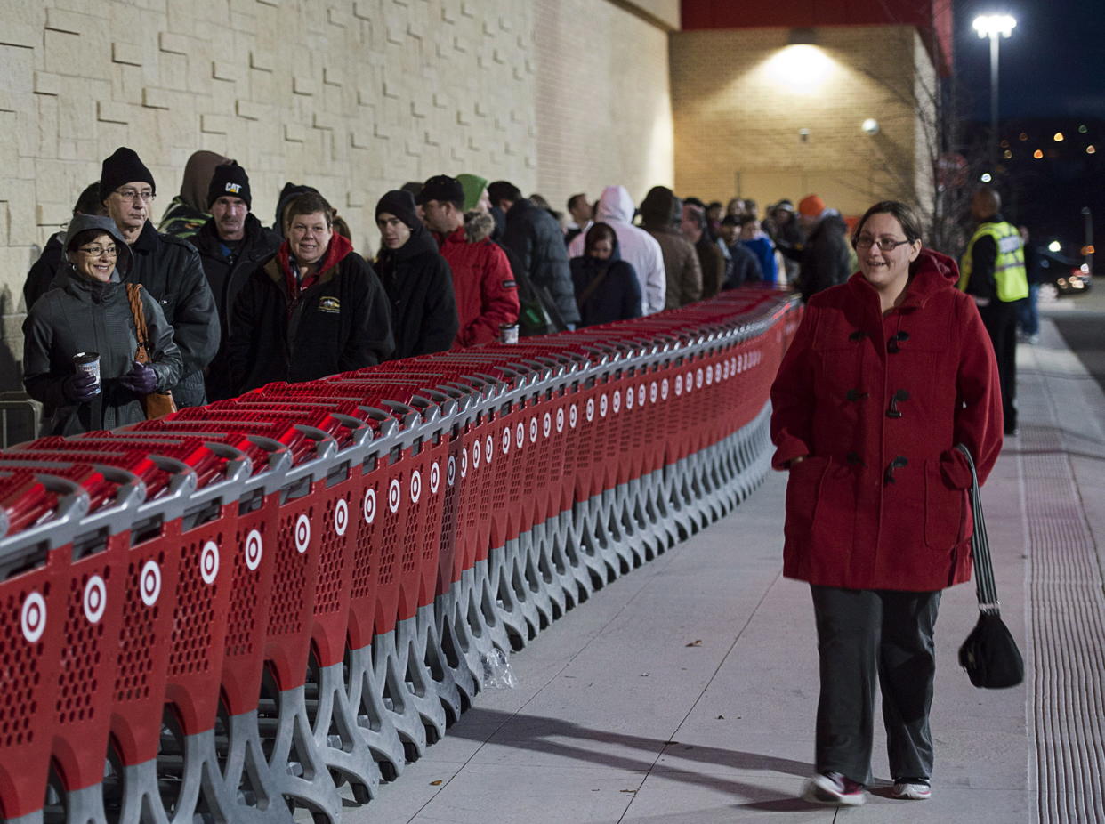 Shoppers wait in line at the Target store in Dartmouth, N.S. on Friday, Nov. 29, 2013. (THE CANADIAN PRESS/Andrew Vaughan)