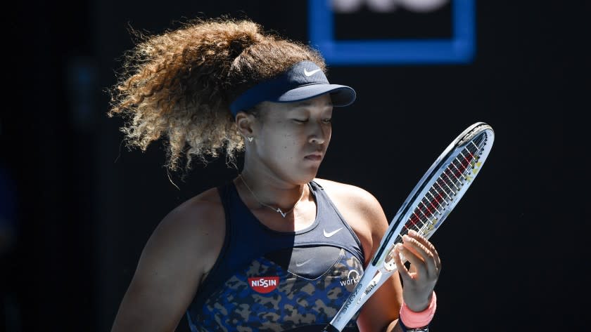 Japan's Naomi Osaka during her semifinal against United States' Serena Williams at the Australian Open Tennis championships in Melbourne, Australia, Thursday, Feb. 18, 2021. (AP Photo/Andy Brownbill)