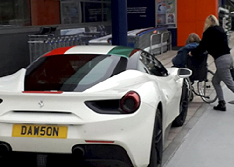 <em>Billionaire Chris Dawson, who owns The Range, has been criticised for apparently blocking disabled access at the opening of his new flagship store with his Ferrari (Picture: SWNS)</em>