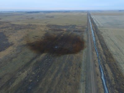 An aerial view shows the darkened ground of an oil spill which shut down the Keystone pipeline between Canada and the United States, located in an agricultural area near Amherst, South Dakota. 


REUTERS/Dronebase