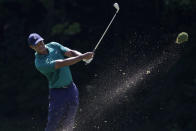 Tiger Woods hits from the 15th fairway during the third round of the Memorial golf tournament, Saturday, July 18, 2020, in Dublin, Ohio. (AP Photo/Darron Cummings)