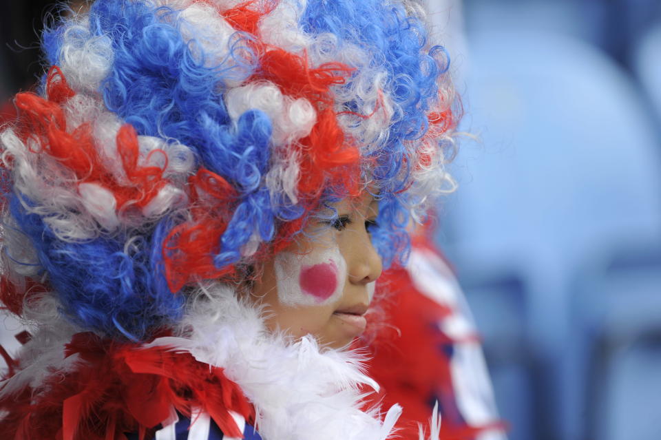 COVENTRY, UNITED KINGDOM - JULY 28: A Japanese fan during the Women's Football first round Group F Match between Japan and Sweden on Day 1 of the London 2012 Olympic Games at City of Coventry Stadium on July 28, 2012 in Coventry, England. (Photo by Francis Bompard/Getty Images)