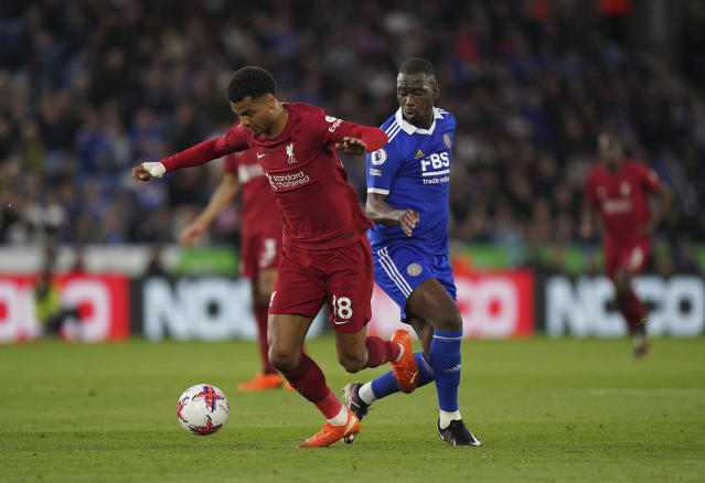 Leicester City's Boubakary Soumare, right, and Liverpool's Cody Gakpo battle for the ball during the English Premier League soccer match between Leicester City and Liverpool at the King Power Stadium, Leicester, England, Monday May 15, 2023. (Tim Goode/PA via AP)