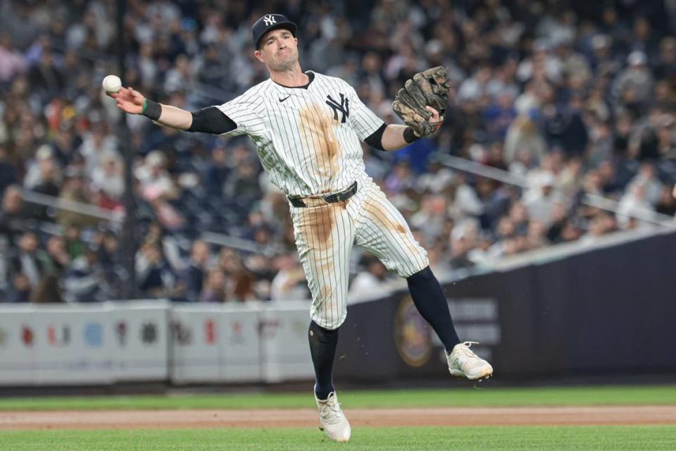 Apr 9, 2024; Bronx, New York, USA; New York Yankees third baseman Jon Berti (19) throws the ball to first base for an out during the fourth inning against the New York Yankees at Yankee Stadium. Mandatory Credit: Vincent Carchietta-USA TODAY Sports