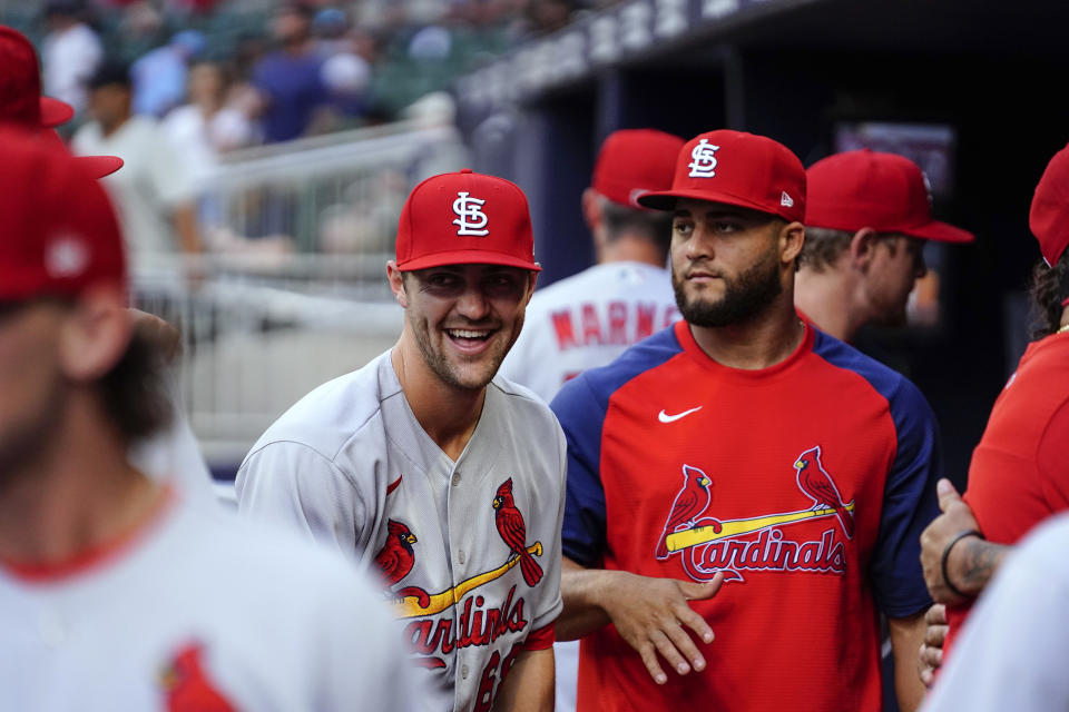 St. Louis Cardinals starting pitcher James Naile laughs in the dugout before the team's baseball game against the Atlanta Braves, Tuesday, July 5, 2022, in Atlanta. (AP Photo/Brynn Anderson)