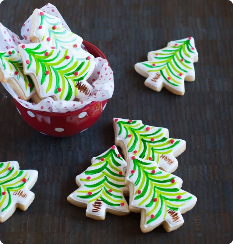 <p>Bake at 350</p><p>Cookies are the perfect canvas for some festive painting.</p><p><strong>Get the recipe: <a href="https://www.bakeat350.net/2013/12/painted-christmas-tree-cookies.html" rel="nofollow noopener" target="_blank" data-ylk="slk:Painted Tree Cookies;elm:context_link;itc:0;sec:content-canvas" class="link rapid-noclick-resp">Painted Tree Cookies</a></strong></p>