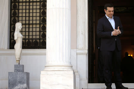 Greek Prime Minister Alexis Tsipras arrives to welcome Cyprus' President Nicos Anastasiades at the Maximos Mansion in Athens, Greece May 25, 2016. REUTERS/Alkis Konstantinidis