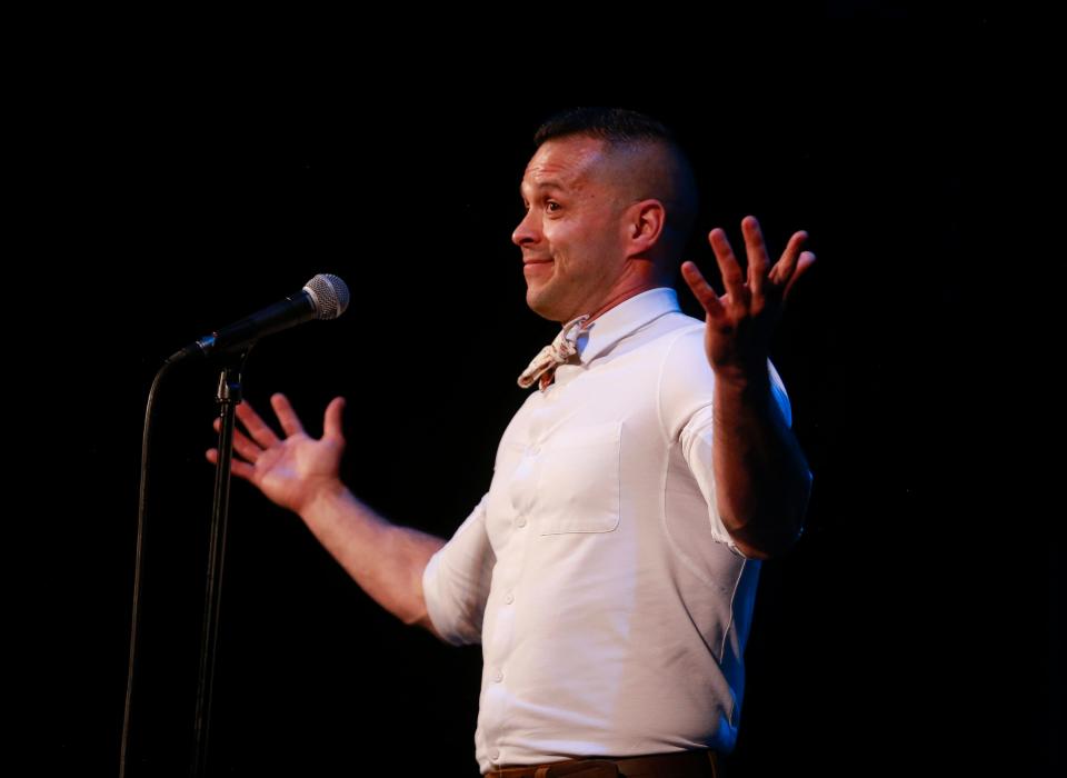 Erik Dominguez shares his story about a journey back to his childhood home in Tucson during the Des Moines Register's Storytellers Project at Hoyt Sherman Place on Tuesday, June 14, 2022.