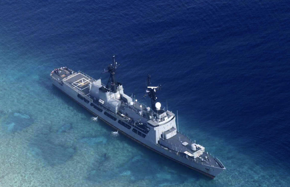 FILE - In this Aug. 29, 2018, file photo provided by the Armed Forces of the Philippines, the Philippine Navy ship BRP Gregorio del Pilar is seen after it ran aground during a routine patrol in the vicinity of Half Moon Shoal, which is called Hasa Hasa in the Philippines, off the disputed Spratlys Group of islands in the South China Sea. Two Philippine security officials told The Associated Press on Tuesday, Sept. 4, 2018, that tugboats were used to pull the BRP Gregorio del Pilar from the shallow fringes of Half Moon Shoal before midnight. The frigate ran aground during a routine patrol Wednesday night, damaging some of its propellers. It's more than 100 crewmen were unhurt. (Armed Forces of the Philippines via AP, File)