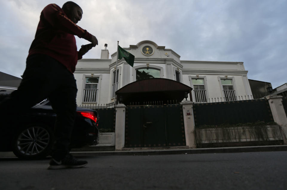 A man walks past Saudi Arabia's consul general's official residence in Istanbul, Wednesday, Oct. 24, 2018. Turkey's state-run news agency says Saudi officials did not allow Turkish investigators, probing the killing of Saudi journalist Jamal Khashoggi, to search a well in the garden of the Saudi Consulate. Turkish forensic teams have searched the Consulate, the consul general's official residence as well as vehicles belonging to the consulate as part of their probe into Khashoggi's disappearance and death. (AP Photo/Lefteris Pitarakis)