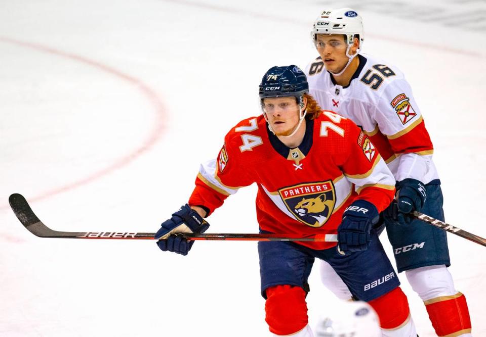 Florida Panthers defenseman Jake Massie (56) protect the goal Panthers right wing Owen Tippett (74) during the first period of the first training camp scrimmage in preparation for the 2021 NHL season at the BB&T Center on Thursday, January 7, 2021 in Sunrise.