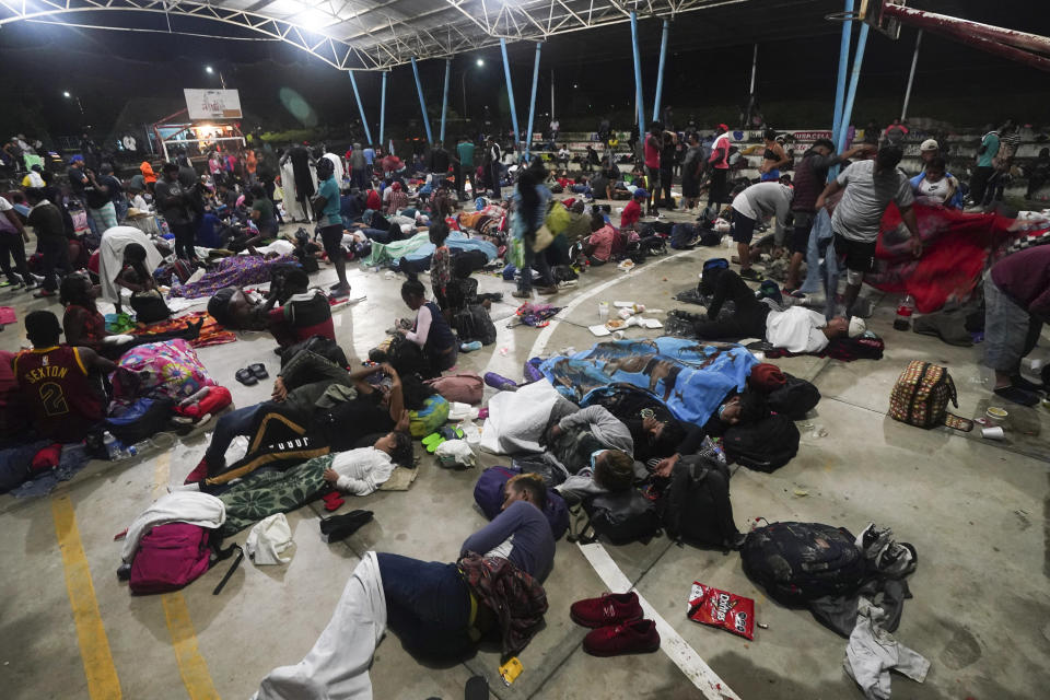 Migrants who were part of a caravan heading north stop to rest in Huixtla, Chiapas state, Mexico, Sunday, Sept. 5, 2021. (AP Photo/Marco Ugarte)