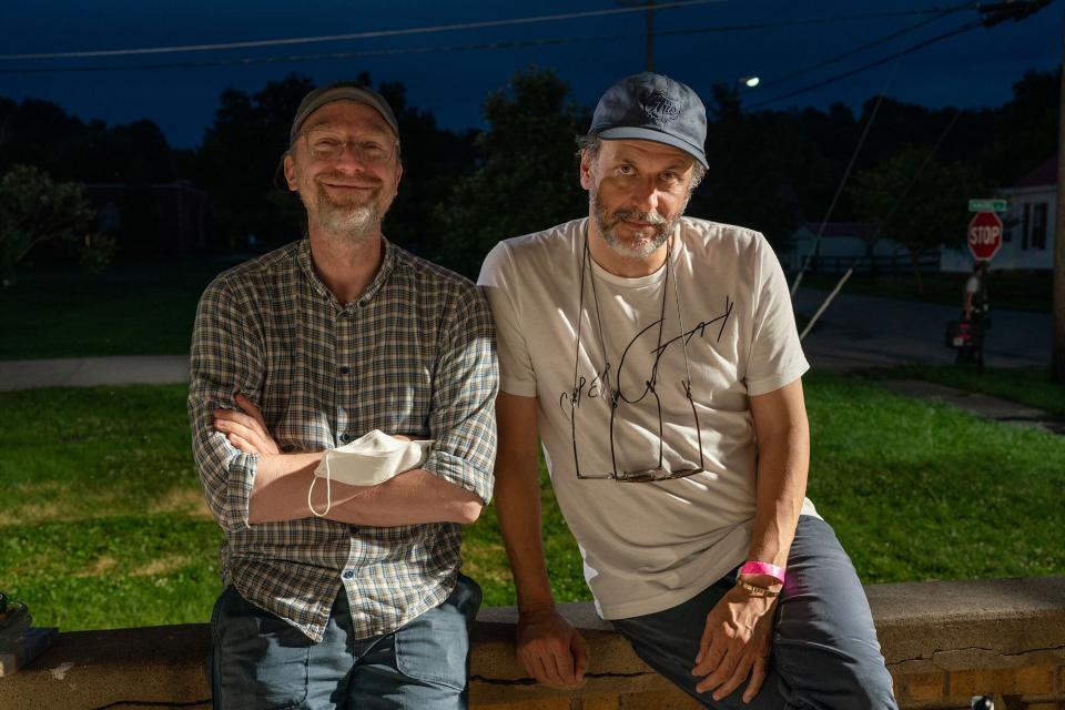 Writer David Kajganich (left) and director Luca Guadagnino (right) on the set of BONES AND ALL