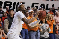 Oklahoma State guard Keylan Boone prepares to shoot against Texas in the second half of an NCAA college basketball game Saturday, Jan. 8, 2022, in Stillwater, Okla. (AP Photo/Sue Ogrocki)