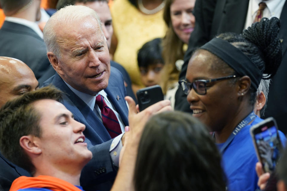 President Joe Biden greets members of the audience after speaking during a visit to a mobile COVID-19 vaccination unit at the Green Road Community Center in Raleigh, N.C., Thursday, June 24, 2021. (AP Photo/Susan Walsh)