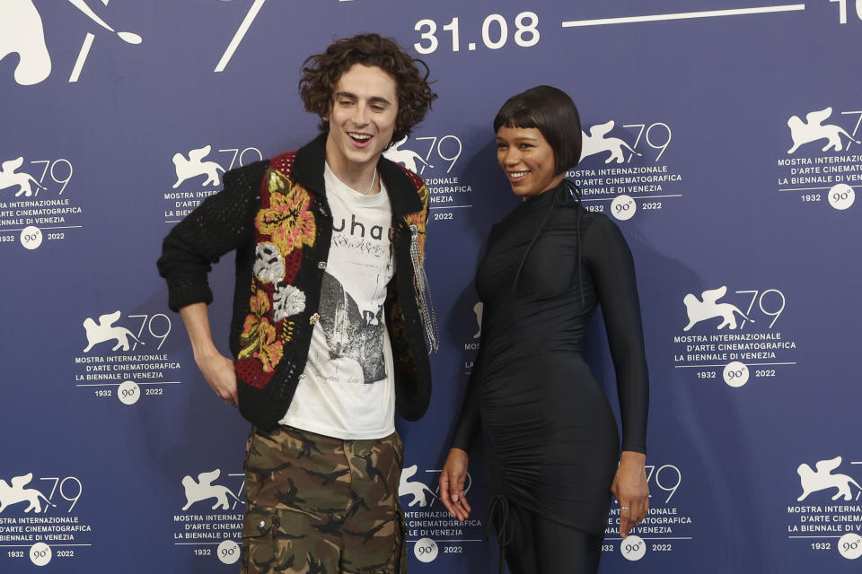 Timothee Chalamet, left, and Taylor Russell pose for photographers at the photo call for the film 'Bones and All'during the 79th edition of the Venice Film Festival in Venice, Italy, Friday, Sept. 2, 2022. (Photo by Joel C Ryan/Invision/AP)