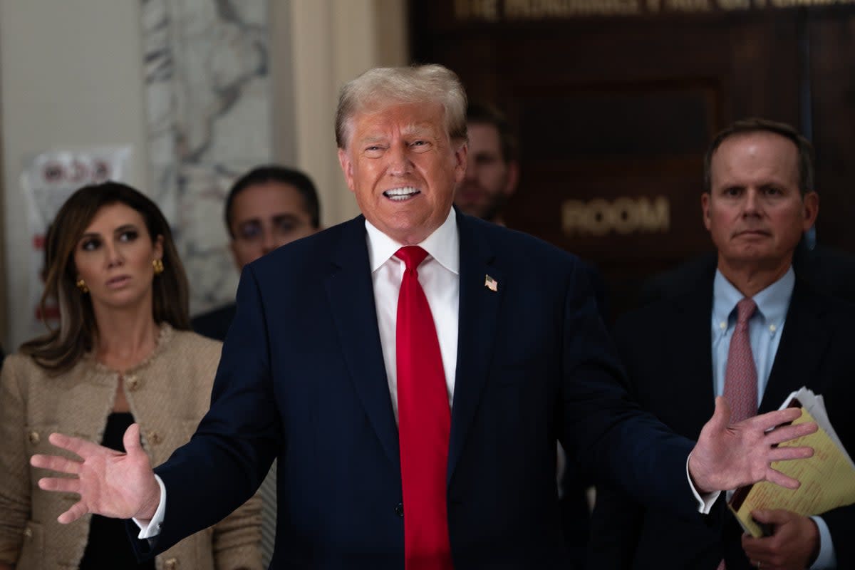 Donald Trump addresses the media during a lunch break on the third day of his civil fraud trial at New York State Supreme Court (Getty Images)