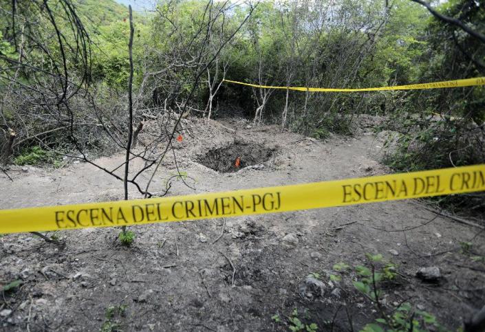 View of a grave in Pueblo Viejo, in the outskirts of Iguala, on October 6, 2014 (AFP Photo/Pedro Pardo)