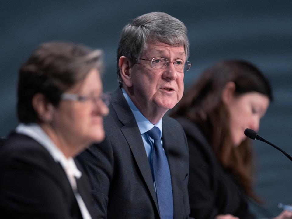 Michael MacDonald, commission chair, is flanked by fellow commissioners Leanne Fitch, left, and Kim Stanton at the Mass Casualty Commission inquiry in Halifax on March 9, 2022. MacDonald earns a per diem of $2,000 per day while Fitch and Stanton earn $1,800.  (Andrew Vaughan/Canadian Press - image credit)