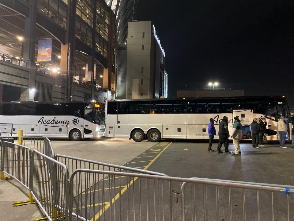 The Dallas Cowboys team buses outside Lincoln Financial Field in Philadelphia. (Henry Bushnell/Yahoo Sports)