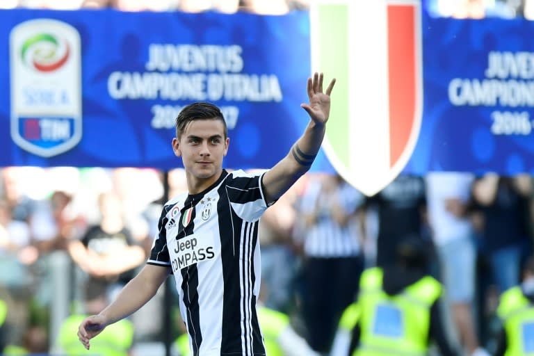 Paulo Dybala celebrates after the 3-0 victory over Crotone handed Juventus a record sixth consecutive Serie A title on May 21, 2017