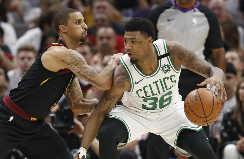 Marcus Smart and the Celtics reached a deal that keeps him in Boston for four more seasons. (AP)