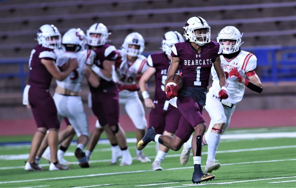 Hawley's Chandlin Myers (1) returns the game's opening kickoff 87 yards for a touchdown against Christoval.