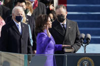 Kamala Harris is sworn in as vice president by Supreme Court Justice Sonia Sotomayor as her husband Doug Emhoff holds the Bible during the 59th Presidential Inauguration at the U.S. Capitol in Washington, Wednesday, Jan. 20, 2021. (AP Photo/Patrick Semansky, Pool)