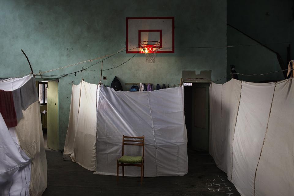 Alessandro Penso, an Italian photographer working for OnOff Picture, won the 1st Prize in the General News Single category of the 2014 World Press Photo Contest with this picture of temporary accommodation for Syrian refugees in Sofia taken November 21, 2013. REUTERS/Alessandro Penso/World Press Photo Handout via Reuters