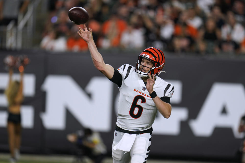 Cincinnati Bengals quarterback Jake Browning throws a pass against the Arizona Cardinals during the second half of an NFL football preseason game in Cincinnati, Friday, Aug. 12, 2022. (AP Photo/Michael Conroy)