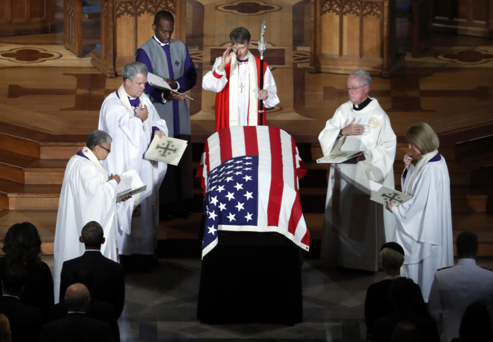 <p>The casket of Sen. John McCain, R-Ariz., is blessed at the end of a memorial service at Washington National Cathedral in Washington, Saturday, Sept. 1, 2018. McCain died Aug. 25, from brain cancer at age 81. (Photo: Pablo Martinez Monsivais/AP) </p>