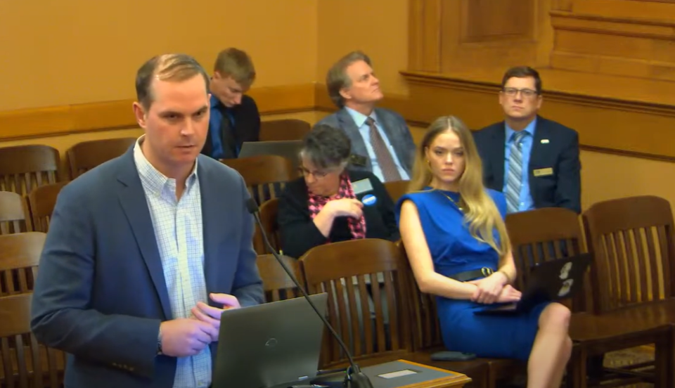 Kieran Carroll, chief strategy officer of the AI school safety technology company ZeroEyes, made a business pitch to a House committee. A K-12 school budget bill requires school districts to contract with ZeroEyes to secure access to state matching grant funding. (Kansas Reflector screen capture from Legislature's YouTube channel)