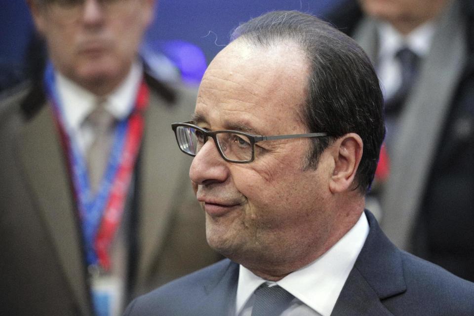 French President Francois Hollande arrives for an EU Summit in Brussels on Thursday, Dec. 15, 2016. European Union leaders meet Thursday in Brussels to discuss defense, migration, the conflict in Syria and Britain's plans to leave the bloc. (AP Photo/Olivier Matthys)