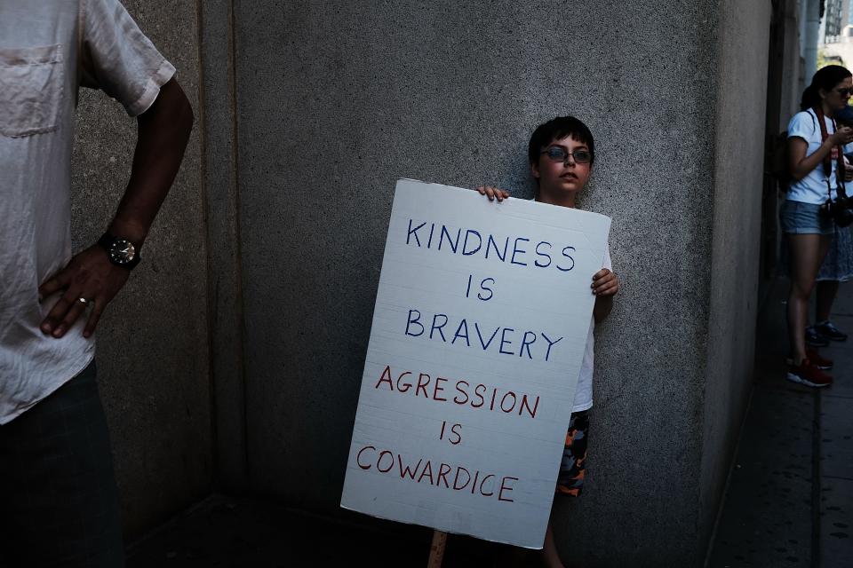 Glamour.com rounded up some of the most powerful signs from the Families Belong Together marches on Saturday.