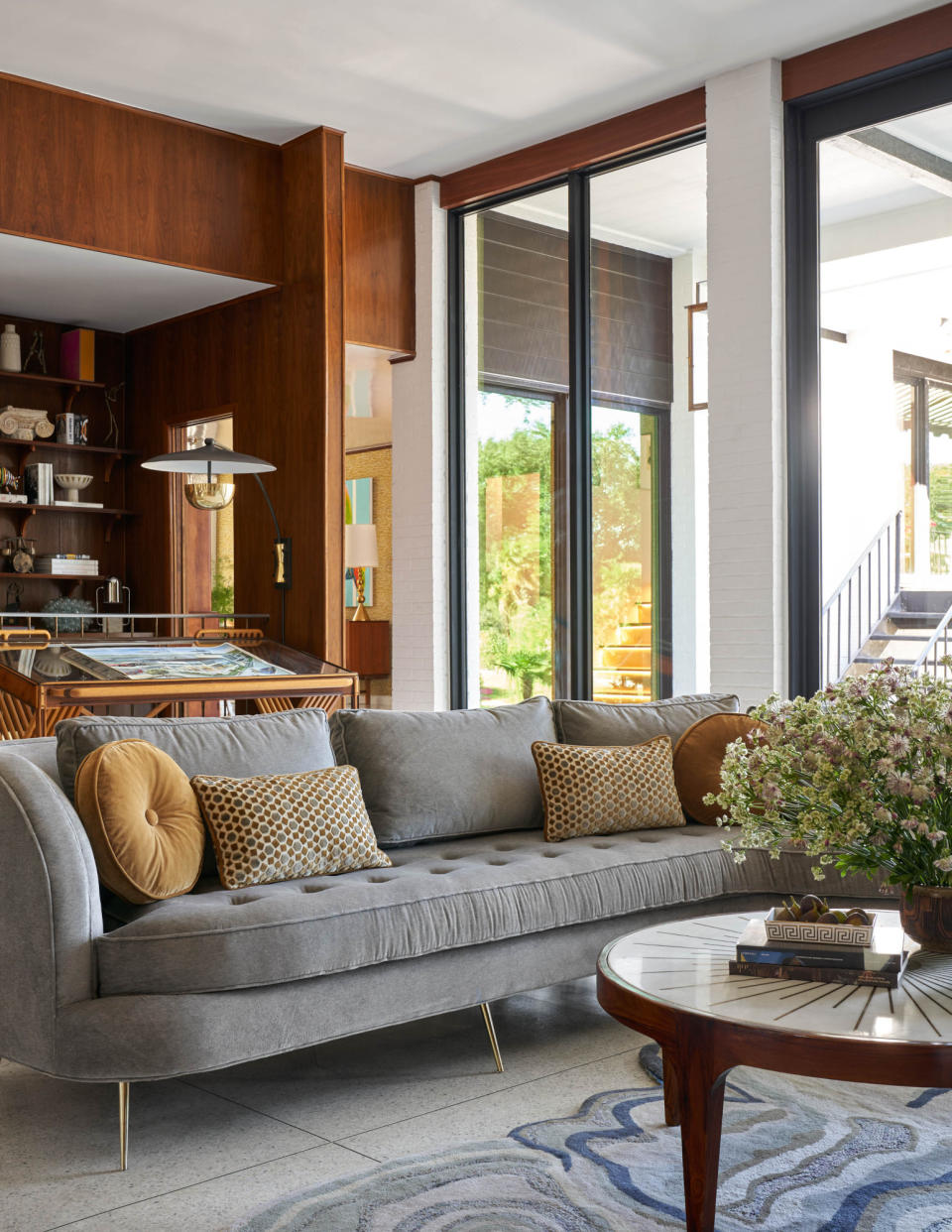 Living room with grey sofa and yellow cushions