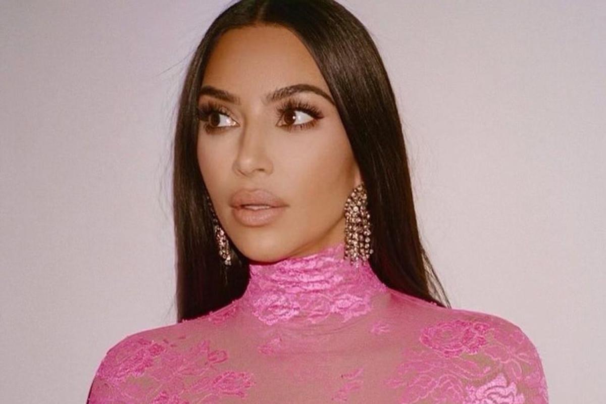 Kim Kardashian suffers NSFW wardrobe malfunction in a silk slip dress at Victoria  Beckham's show in Paris