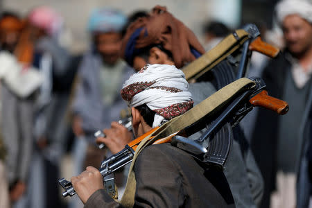 Houthi followers perform the Barca dance at a gathering showing support for the Houthi movement in Sanaa, Yemen December 19, 2018. REUTERS/Khaled Abdullah