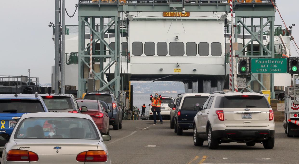 Traffic is loaded onto the Washington State Ferry Kittitas at the Southworth ferry dock on Monday, March 1, 2021.