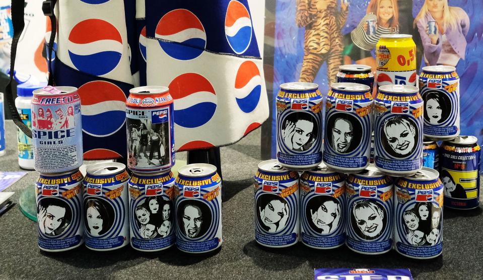 A set of Pepsi cans on Spice Girls memorabilia goes on display during the 'SpiceUp London' exhibition at Business Design Centre in London