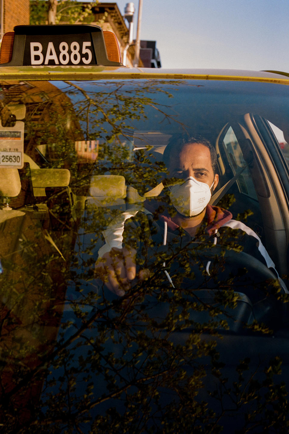 Almontasir Ahmed Mohamed, 33, Taxi Driver and Engineering Student, Brooklyn. Mohamed, who came to the U.S. from Sudan, says many of his customers recently have come from hospitals. “I’m just praying five times every day to keep this virus away, and for my family,” he says. 