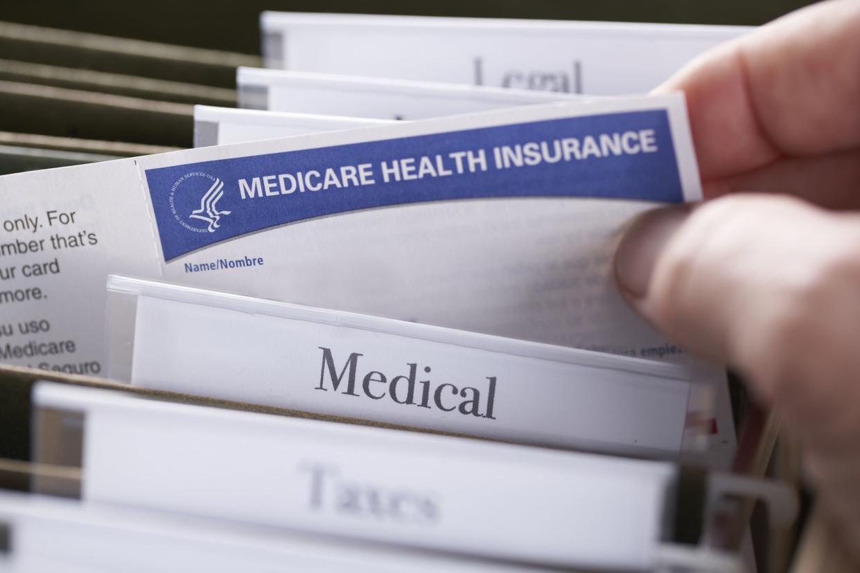 Medicare Health Insurance card in file folder