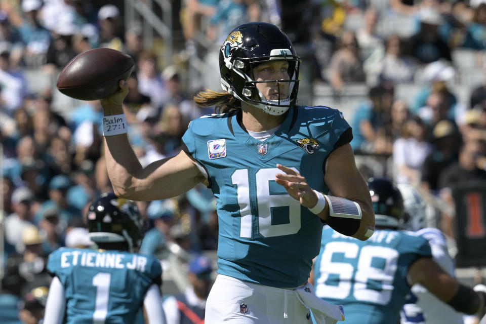 Jacksonville Jaguars quarterback Trevor Lawrence (16) looks to pass against the Indianapolis Colts during the first half of an NFL football game, Sunday, Oct. 15, 2023, in Jacksonville, Fla. (AP Photo/Phelan M. Ebenhack)