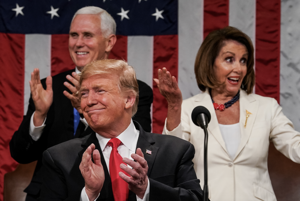 U.S. President Donald Trump, Speaker Nancy Pelosi and Vice President Mike Pence applaud during the State of the Union address in the chamber of the U.S. House of Representatives at the U.S. Capitol Building on February 5, 2019 in Washington, DC. (Photo: Doug Mills-Pool/Getty Images)