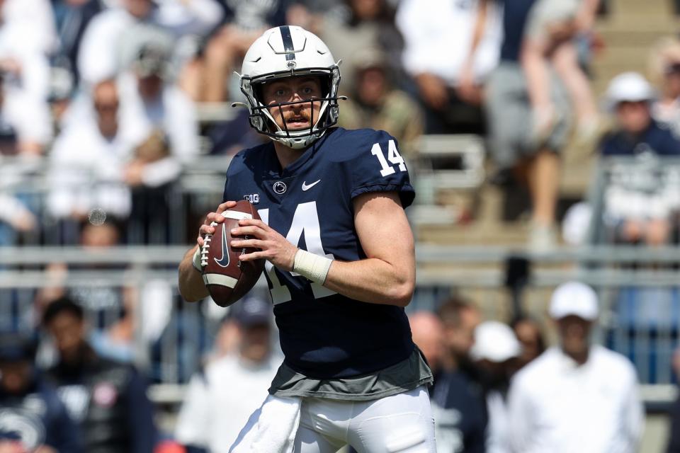 Apr 23, 2022; University Park, Pennsylvania, USA; Penn State Nittany Lions quarterback Sean Clifford (14) looks to throw the ball during the Blue White spring game at Beaver Stadium. The defense defeated the offense 17-13.