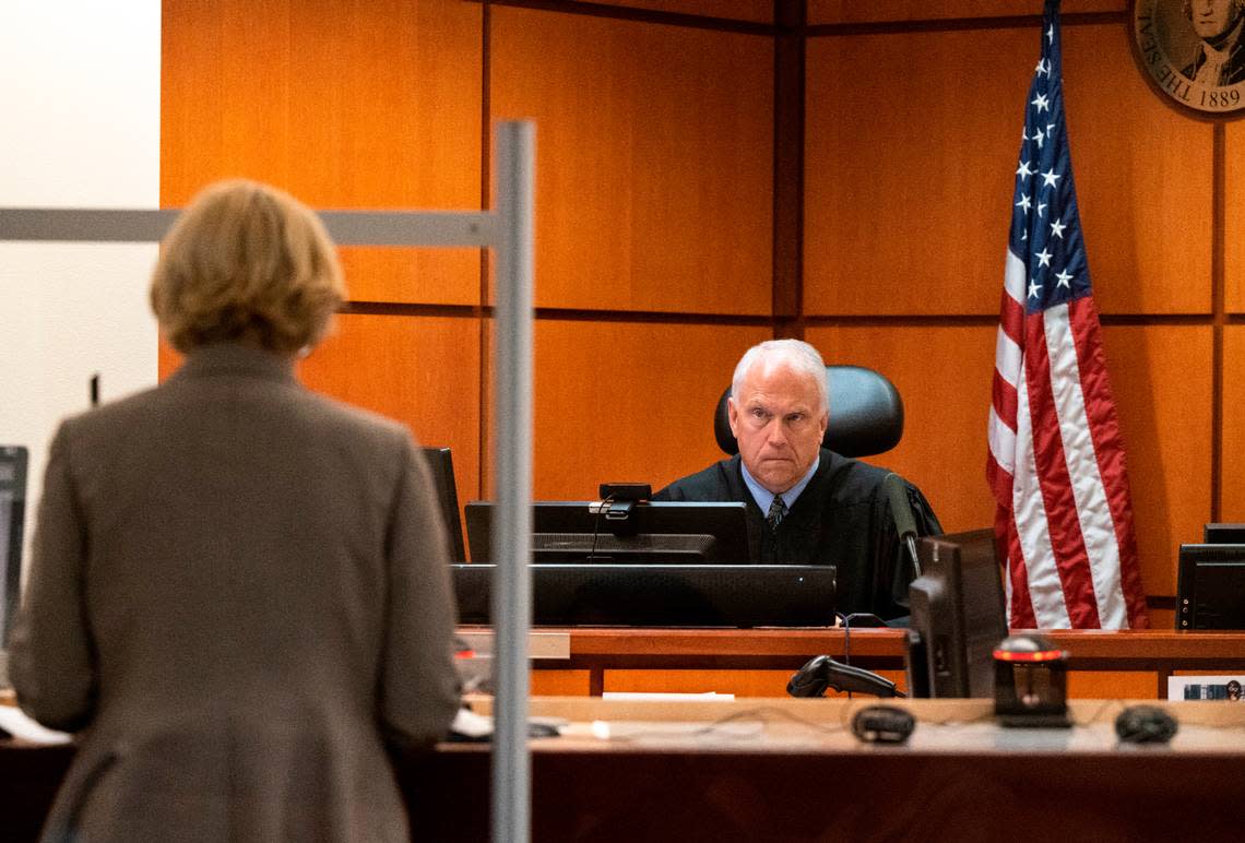 Superior Court Judge Edmund Murphy listens to deputy prosecuting attorney Lisa Wagner during the arraignment of Jeremiah Anthony Greg Averitt, 17, and Christopher Anthony P Felizardo, 17, who are accused of shooting at a car full of five or six young people Wednesday morning near the intersection of South 19th Street and MLK Jr. Way in the city’s Hilltop neighborhood and killing Iyana Ussery, in Pierce County Superior Court in Tacoma, Wash. on Friday, July 8, 2022. The teenagers were charged with second-degree murder along with other charges regarding the incident.