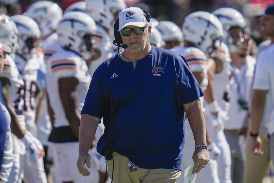 UTEP head coach Dana Dimel walks the sideline during the first half of an NCAA college football game against Northwestern, Saturday, Sept. 9, 2023, in Evanston, Ill. (AP Photo/Erin Hooley)