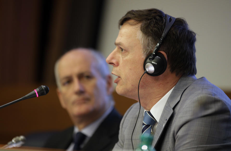 Italian Civil Protection head Franco Gabrielli, left, listens to Costa Crociere CEO Michael Thamm during a press conference to present the Costa Concordia recovery project, in Rome, Friday, Jan. 10, 2014. During a press conference in Rome on Friday, Jan. 10, 2014, officials announced the shipwrecked Costa Concordia will be removed from its watery graveyard off Tuscany in June and taken to a port to be dismantled, the final phase of an unprecedented 600 million-euro ($817 million) salvage effort. The announcement came just days before the second anniversary of the Jan. 13, 2012, grounding that killed 32 people. (AP Photo/Andrew Medichini)