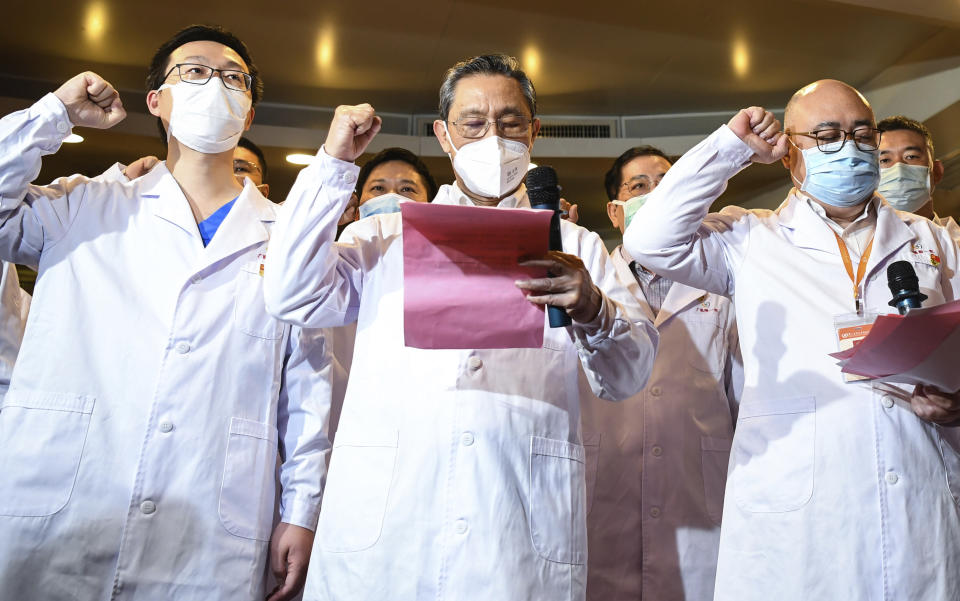 In this March 2, 2020 photo released by Xinhua News Agency, renowned Chinese respiratory specialist Zhong Nanshan attends an oath-taking ceremony via video connections for two new probationary Communist Party members in Wuhan to take the oath of joining the Communist Party of China, in Guangzhou, southern China's Guangdong Province. As the rest of the world grapples with a burgeoning virus outbreak, China's ruling Communist Party has turned to its propaganda playbook to portray its leader as firmly in charge, leading an army of health workers in a "people's war" against the disease. (Deng HuaXinhua via AP)