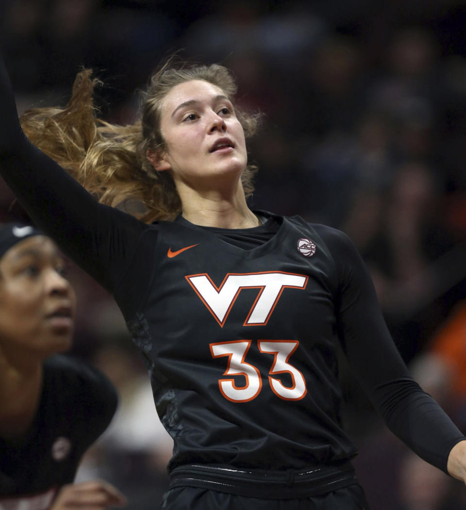 Virginia Tech's Elizabeth Kitley (33) watches a shot attempt during the first half of an NCAA college basketball game against Syracuse in Blacksburg, Va., Thursday, Feb. 2, 2023. (Matt Gentry/The Roanoke Times via AP)