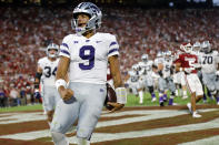 Kansas State quarterback Adrian Martinez celebrates after a touchdown against Oklahoma during the first half of an NCAA college football game Saturday, Sept. 24, 2022, in Norman, Okla. (AP Photo/Nate Billings)